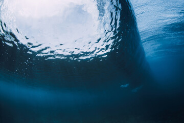 Wave underwater. Blue ocean in underwater. Perfect surfing wave