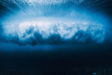 Storm wave underwater. Blue ocean in underwater. Surfing barrel wave