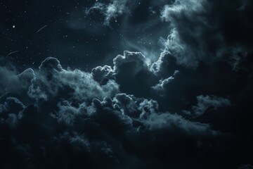 Majestic clouds illuminated by moonlight create a stunningly dramatic nightscape, offering a mystical and awe-inspiring view.

