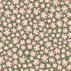 A green seamless background with a pink flower pattern. The flowers are small and pink