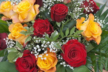 red and yellow roses bunch of flowers floristry gypsophila