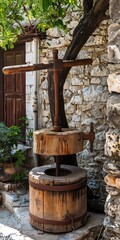Fototapeta premium Vertical Image of Traditional Wooden Olive Press in a Village Travel Back in Time 