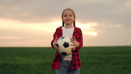little girl schoolgirl with soccer ball, happy face child kid smile, street game soccer ball stadium, sunny day football, green space sports, relaxed soccer game, denim jeans football, outdoor soccer