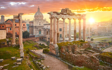 Naklejka premium Roman Forum in Rome, Italy. Antique structures with columns. Wrecks of ancient italian roman town. Sunrise above famous architectural landmark Europe