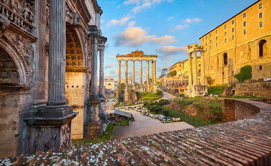 Roman Forum in Rome, Italy. Antique structures with columns. Wrecks of ancient italian roman town....