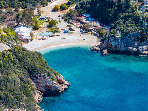 Aerial View of B&uuml;y&uuml;k&ccedil;akıl Beach, Kas, Turkey: Serene Cove with Turquoise Waters and Lush Greenery
