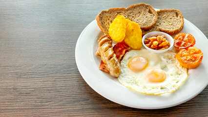 Hearty traditional breakfast plate with eggs, bacon, tomatoes, and bread caters to a trend towards...