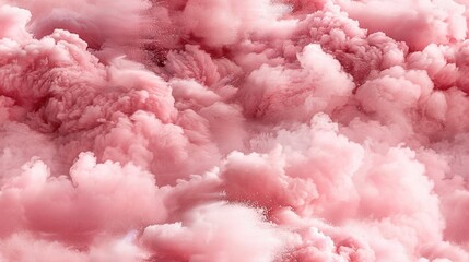   Many pink clouds drift in the sky, with one cloud hovering above ground