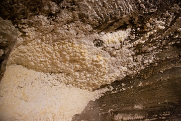 WIELICZKA, POLAND - JUNE 30: Interior view Wieliczka salt mine with textured salt walls ceiling