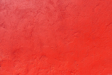 Texture of an old red plastered wall. Abstract construction background.