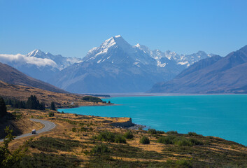 Postcard view of New Zealand's Mt. Cook and Lake Pukaki, which gets its brilliant color from glacial silt. 
