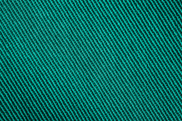 Closeup of green textured cloth background