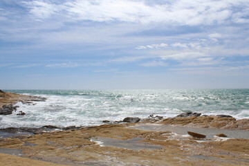 waves on the beach,natural background of sky, sea and rocks, Mediterranean coast in Spain 