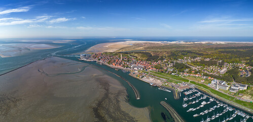 Aerial drone image of the historic Frisian town of West Terschelling on the Wad island in world...