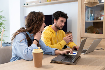 man and woman working together to get positive results