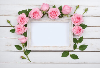 Pink rose flowers with photo frame for text
