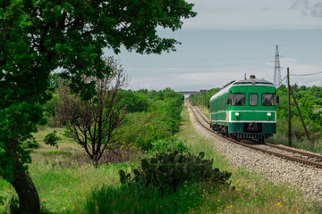 Green train or zeleni vlak, connecting Ljubljana, Slovenia and Pula, Croatia, on its way towards...