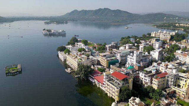 Aerial view of Udaipur city, known for its beautiful lakes, palaces, and historical significance. The city was founded in 1559.