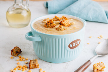Vegan Yellow split pea soup puree with croutons
