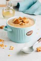 Vegan Yellow split pea soup puree with croutons