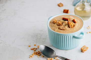 Vegan Yellow split pea soup puree with croutons