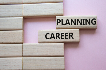 Planning Career symbol. Wooden blocks with words Planning Career. Beautiful pink background. Business and Planning Career concept. Copy space.