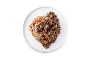Buckwheat soba with ground meat and spicy eggplant and pepper slices on a white isolated background