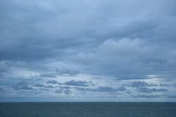 Fototapeta premium clouds over the sea. Stormy sky over the sea in the evening.