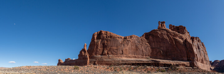 Panoramic view of Courthouse Towers on a Sunny Blue sky day in Arches National Park