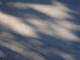 Light and shadow asphalt background