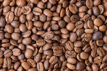 Roasted coffee as a background. Coffee beans.