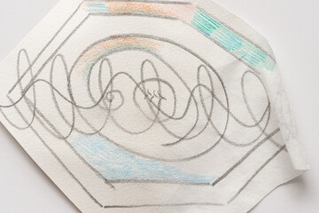 close-up of wavy looping graphite lines on hexagonal shapes