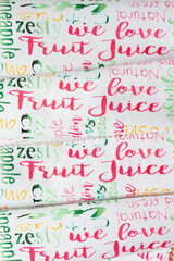 word print fabric with fun summer themed messages (we love fruit juice)
