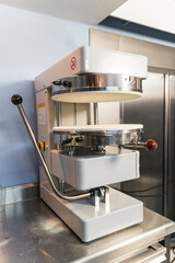 machine for preparing dough and making pastry in industrial food or bakery. High quality photo