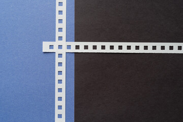 blue and black construction paper with coil binding strips
