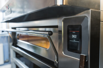 view of an electric oven, modern technique for making pizza. High quality photo