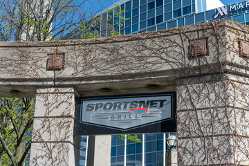Obraz premium exterior sign of Sportsnet Grill, a sports bar, located at 1 Blue Jays Way, Floor 1 of the Rogers Centre in Toronto, Canada