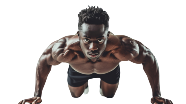 Young athletic black man doing push-ups on white background. Muscular and strong guy exercising