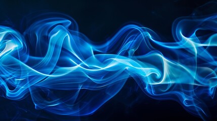 Fototapeta premium Artistic swirls of blue smoke on a dark background