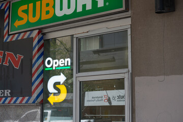 Obraz premium exterior facade and sign at Subway a fast food sandwich shop located here at 275 Dundas Street West in Toronto, ON