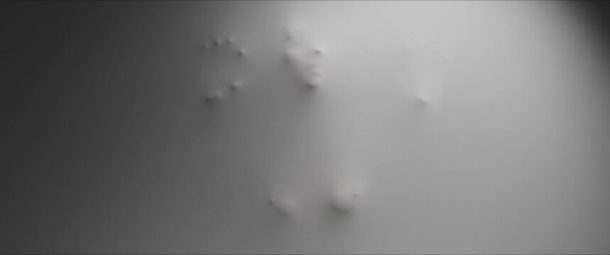 The shape of a woman reveals itself from the white surface