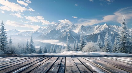 A wooden deck looks out over a snowy mountain landscape. The sky is blue and the sun is shining. The trees are bare and the snow is thick on the ground.