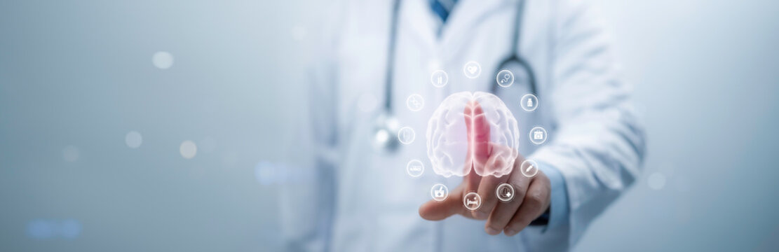 Medical worker touch digital medical interface icon while simultaneously checking brain testing results on computer interface, illustrating the integration of medical technology and network concepts
