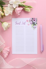 Guest list, pen, tulle fabric and beautiful flowers on pink background, flat lay. Space for text