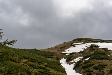 Snow on the mountain slopes in early May. 