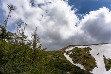 Clouds over the mountains, beautiful scenery of the mountains. 