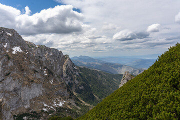 Clouds over the mountains, beautiful scenery of the mountains. 