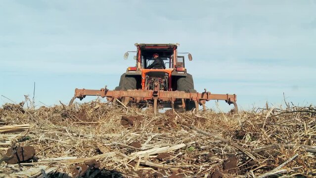 Tractor Plowing Farmland in Argentina, Rural Agriculture Scene, 4K