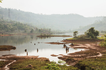 A large lake at the bottom of a mountain