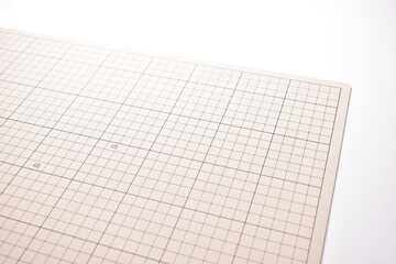 gray cutting mat board on white background with line and scale measure guide pattern for object art...